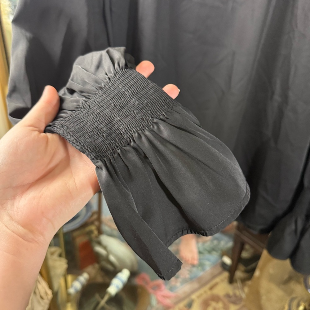 Dressin Women’s Black Long Puff Sleeve Blouse with Smocked Wrists - Picture 4 of 7